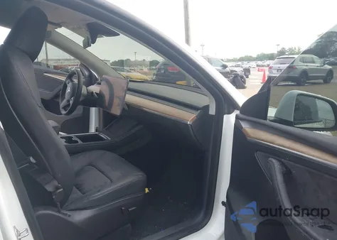 2023 Tesla Model Y from USA, damaged, VIN 7SAYGDEE4PA061776